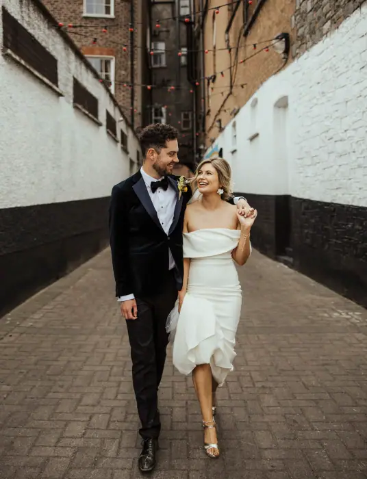 A couple photographed together on their wedding day