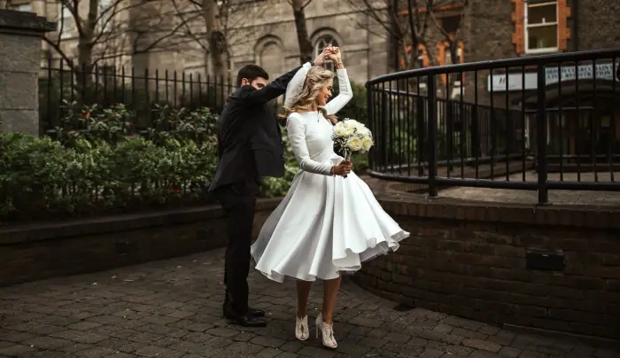 A couple photographed together on their wedding day